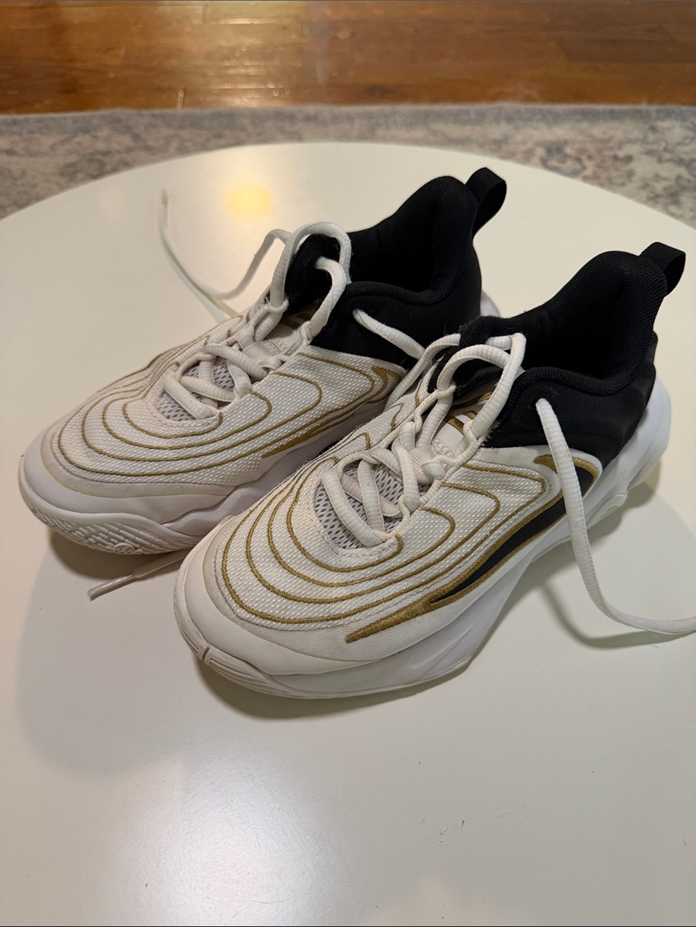 Kids basketball shoes White and Black Athletic Sneakers with Gold Accents